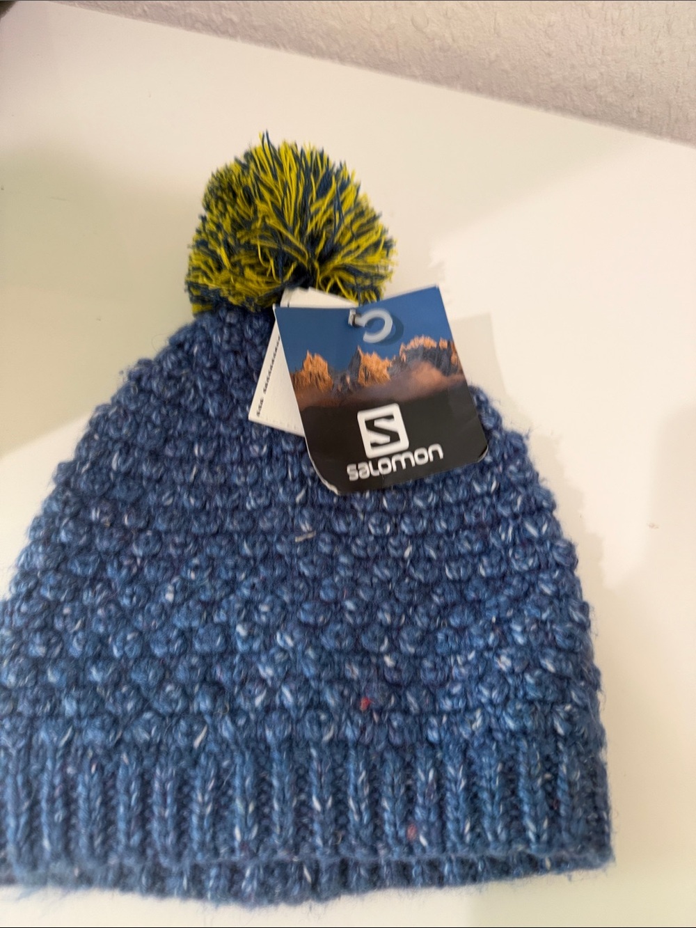 Salomon Blue Knit Beanie with Yellow-Green Pom